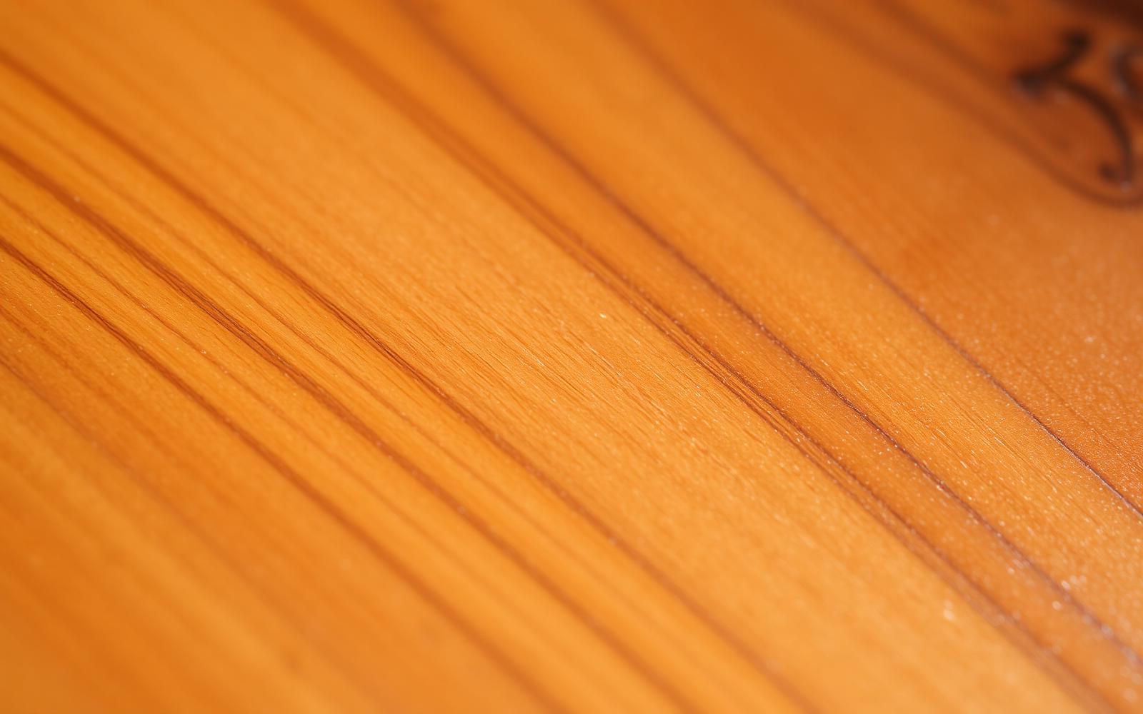 Kiln-dried sawn teak boards showing grain